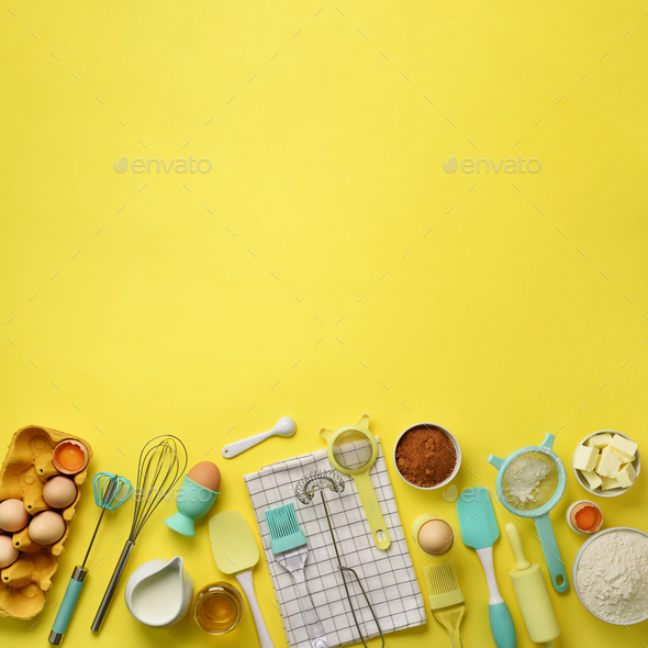 Square crop. Baking ingredients - butter, sugar, flour, eggs, oil, spoon, rolling pin, brush, whisk - Stock Photo - Images