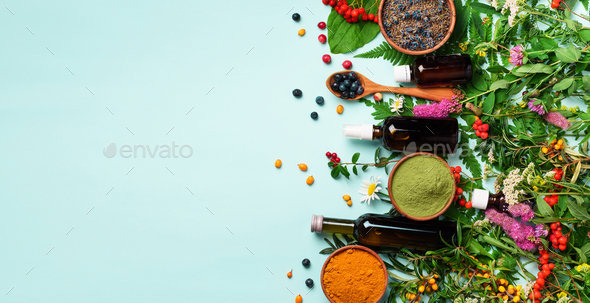 Healthy super food, berries, turmeric, spirulina, omega acid capsules, vitamin c supplement - Stock Photo - Images
