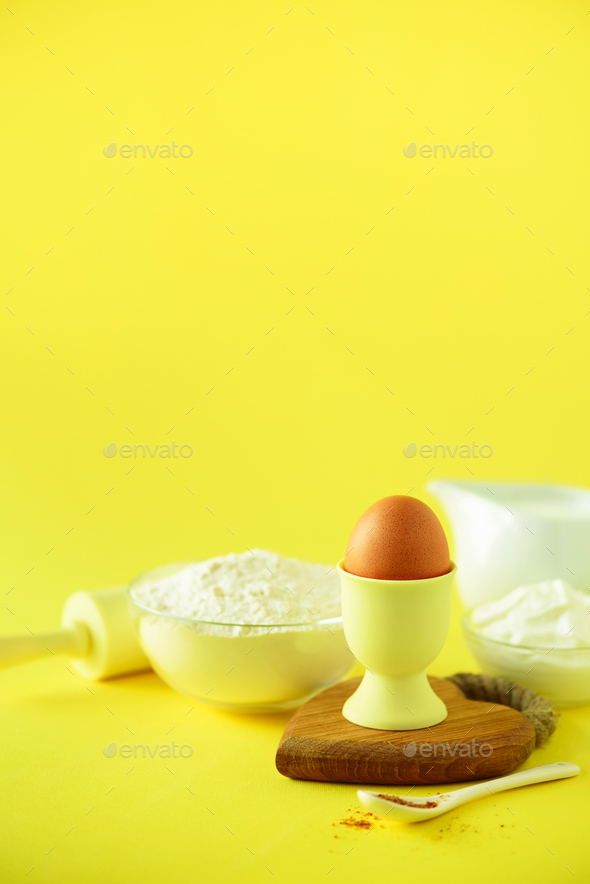 Bakery food frame, cooking concept. Different baking ingredients - butter, sugar, flour, milk, eggs - Stock Photo - Images