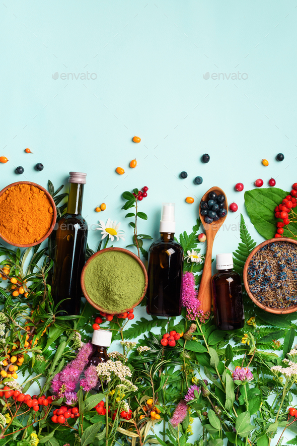 Healthy super food, berries, turmeric, spirulina, omega acid capsules, vitamin c supplement - Stock Photo - Images