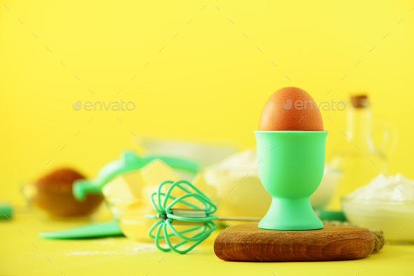 Time to bake. Baking ingredients - butter, sugar, flour, eggs, oil, spoon, rolling pin, brush, whisk - Stock Photo - Images