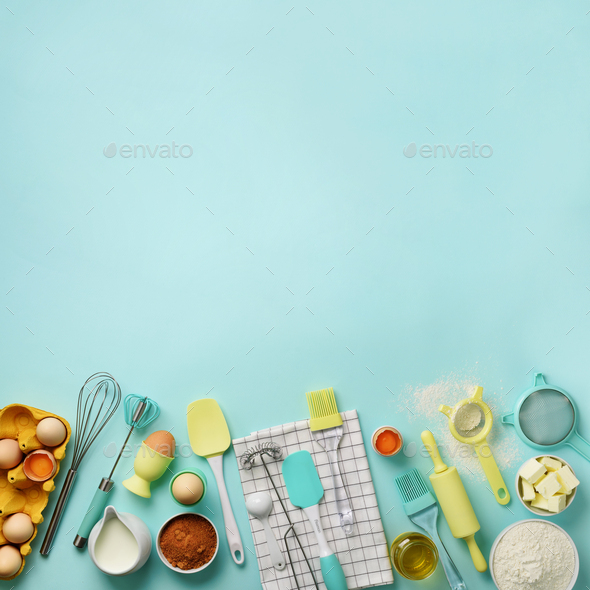 Square crop. Baking ingredients - butter, sugar, flour, eggs, oil, spoon, rolling pin, brush, whisk - Stock Photo - Images