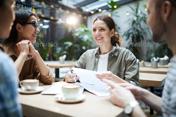 Cheerful startuppers working on new project - Stock Photo - Images