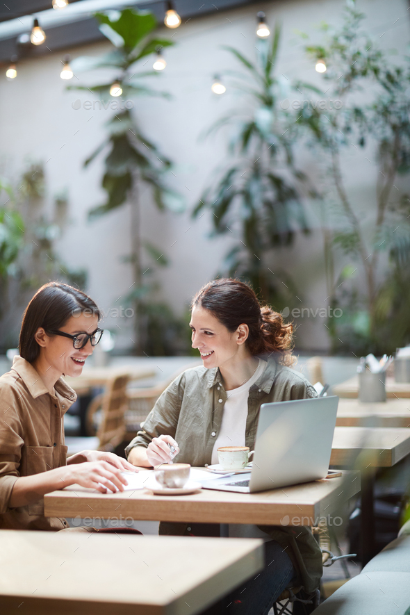 Female entrepreneurs elaborating strategy - Stock Photo - Images