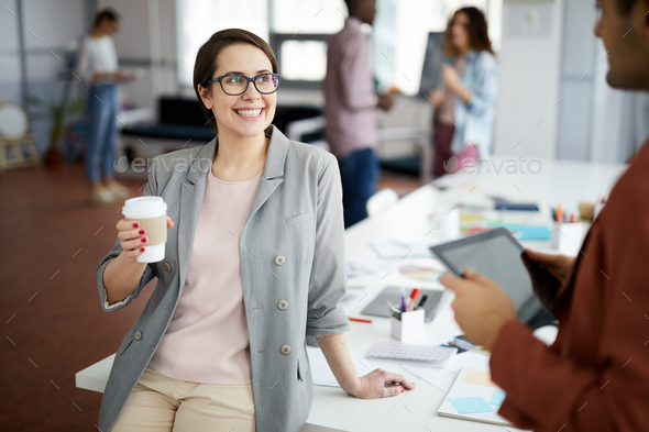 Contemporary Businesswoman at Coffee Break - Stock Photo - Images