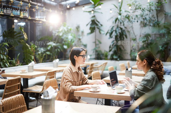 Women brainstorming about project - Stock Photo - Images