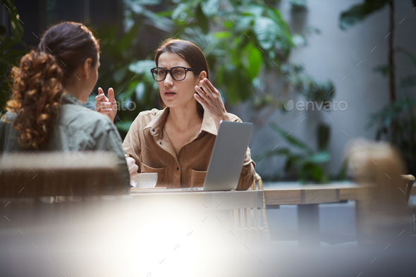 Ladies brainstorming about business project - Stock Photo - Images