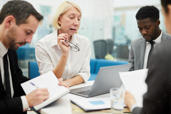 Mature Boss in Meeting - Stock Photo - Images