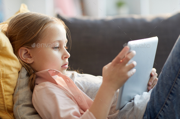 Little Girl Using Internet - Stock Photo - Images
