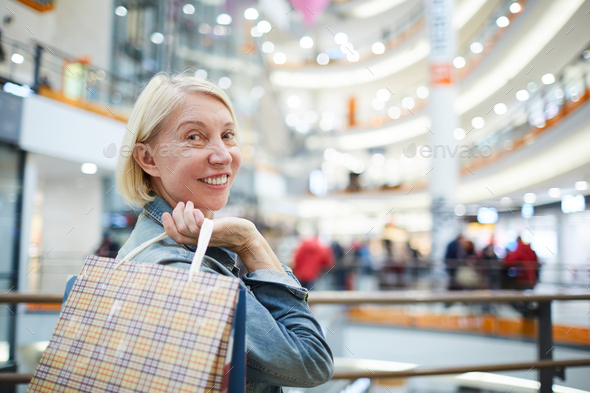 Lady enjoying good shopping - Stock Photo - Images