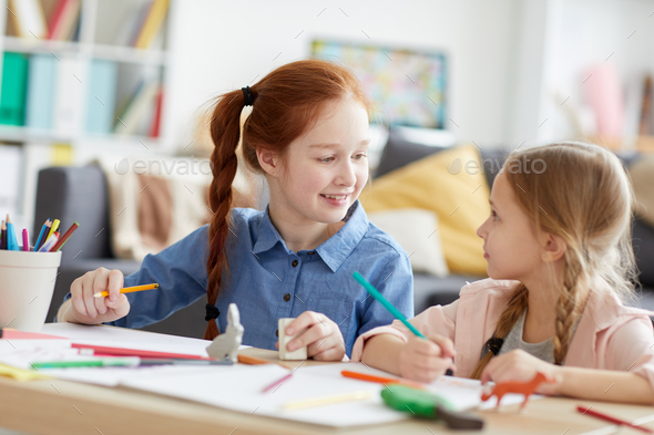 Cheerful Girls Drawing Pictures - Stock Photo - Images