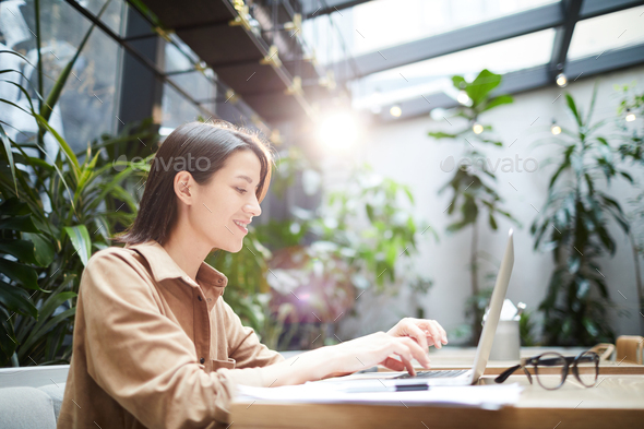 Web administrator answering messages - Stock Photo - Images
