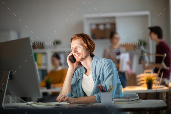Man by computer - Stock Photo - Images