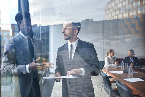 Negotiating at meeting - Stock Photo - Images