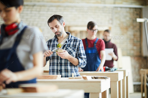 Measuring wooden detail - Stock Photo - Images