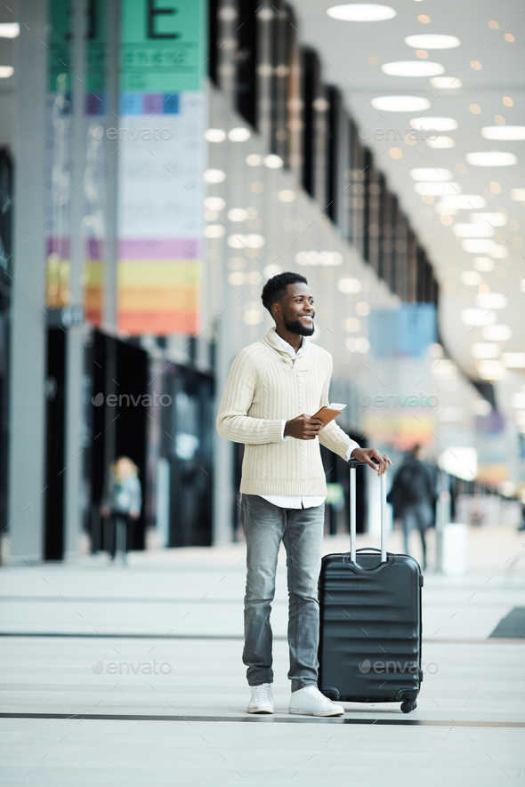 Waiting for flight announcement - Stock Photo - Images