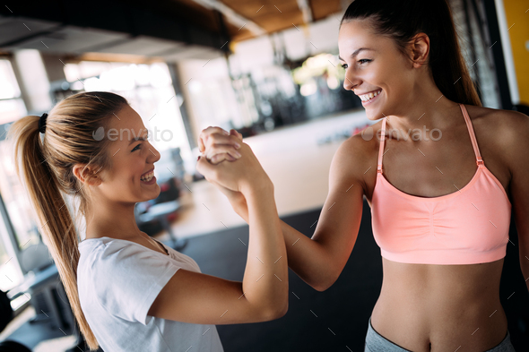 Women working out in gym - Stock Photo - Images