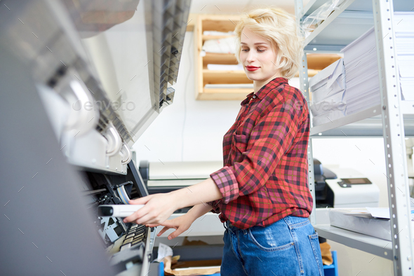 Young Woman Working with Plotter