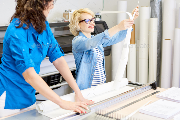 Two Women Working in Printshop