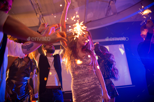 Young Woman Dancing at Awesome Party - Stock Photo - Images