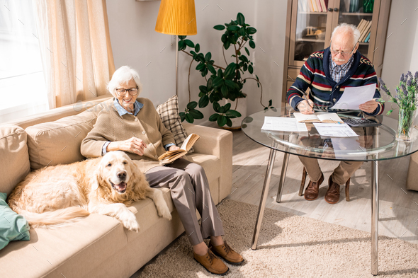 Happy Senior Couple with Family Pet