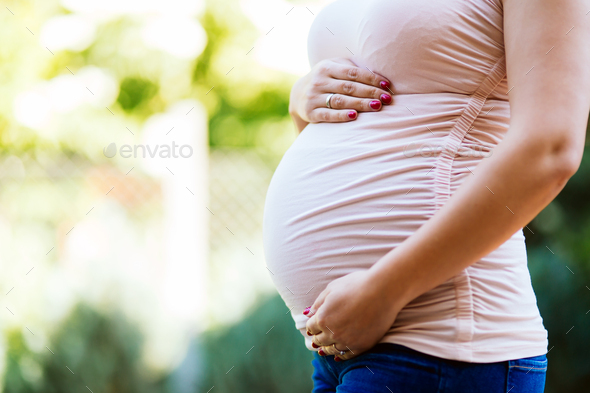 Pregnancy at summer - Stock Photo - Images