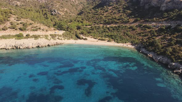 Aerial coastline of Datca with deep and crystal blue cove and clear turquoise water alt
