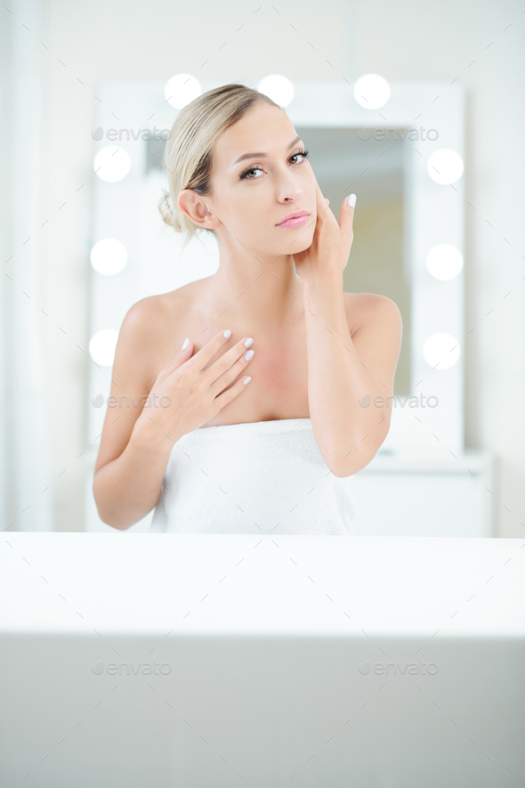 Woman enjoying lotion effect - Stock Photo - Images