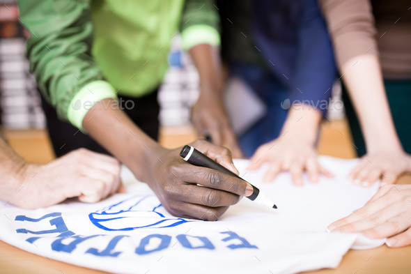 Football Player Signing T-shirt - Stock Photo - Images