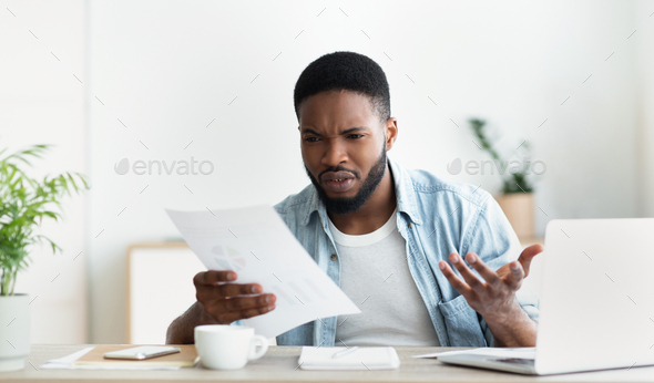 Frustrated employee shocked by reading financial report of his company