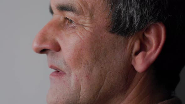 Close Up Face and Eyes of an Senior Asian Man alt