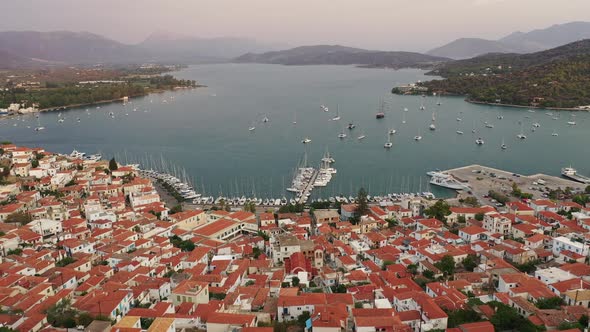 Aerial View of Poros Old Town and Marina or Seaport Greece  Drone Videography alt