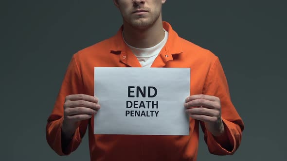 End Death Penalty Phrase on Cardboard in Hands of Caucasian Prisoner, Protest alt