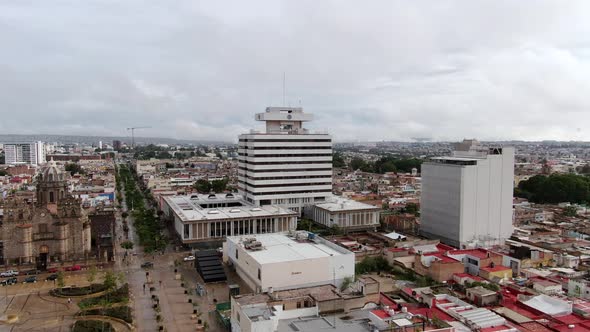 Palacio Federal Building In Downtown Guadalajara, Jalisco, Mexico On A Cloudy Day. wide aerial alt