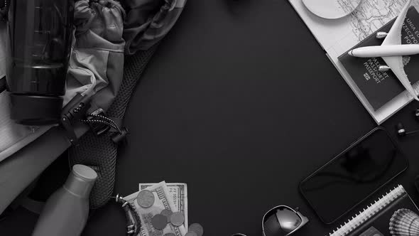 Travel and Tourist Concept. Vacation and Travel Accessories Placed on Black Background. alt