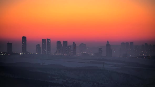 8K Sunrise Over High Skyscraper Constructions in City alt