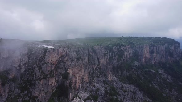 Rock. Cloudy. Canyon. Atmospheric. The mountains.