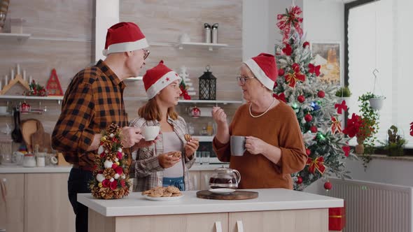 Child Discussing with Grandparents Eating Baked Homemade Delicious Cookies alt