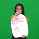 Sad African American Teen Girl Holding No Animal Testing Message Looking at Camera with Serious - VideoHive Item for Sale