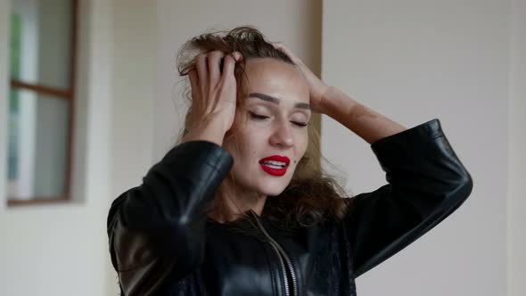 Portrait of Charming and Attractive Woman Indoors Sexy Lady with Red Lips alt