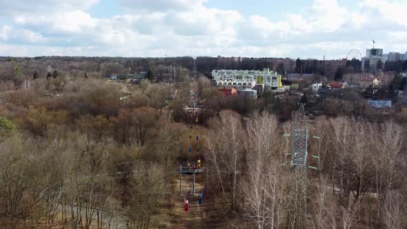 Aerial view on colored cableway cabins in spring