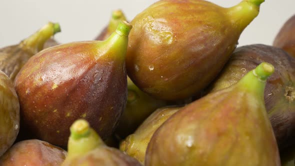 Juicy figs close-up food background panning 4K 2160p UHD footage - Tasty figs on whie food 4K 3840X2 alt
