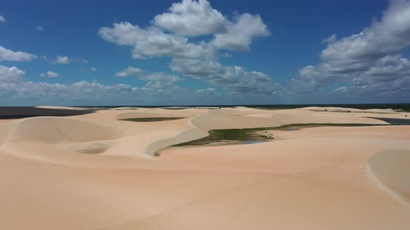 Sand dunes mountains and rain water lagoons at northeast brazilian paradise. alt