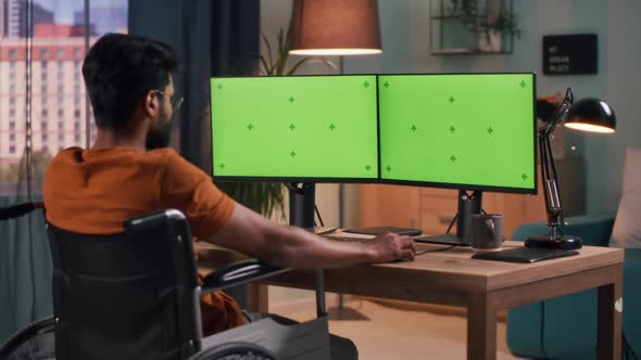 Man with Disability Using Computer alt