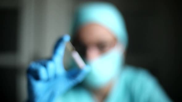 Doctor holding a recipient with the coronavirus COVID-19 vaccine