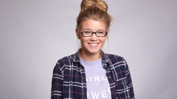 Portrait of young woman on white background