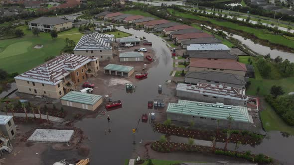 Standing water on the streets in a suburban South Florida neighborhood after a storm alt