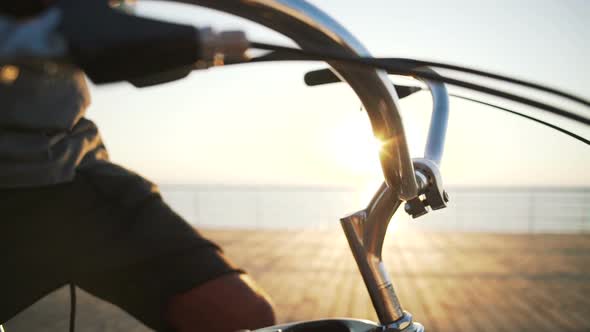 Bicycle Handle Bar Near the Sea During Sunrise Close Up alt