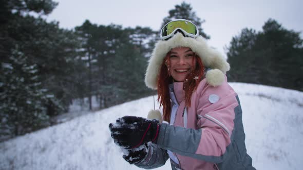 Winter Fun Happy Smiling Woman Having Fun Playing Snowballs in Snowy Forest During Active Weekend