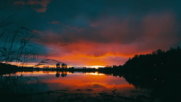 Beautiful Panoramic Sunset Reflecting on Small Pond in North Pole, Alaska.